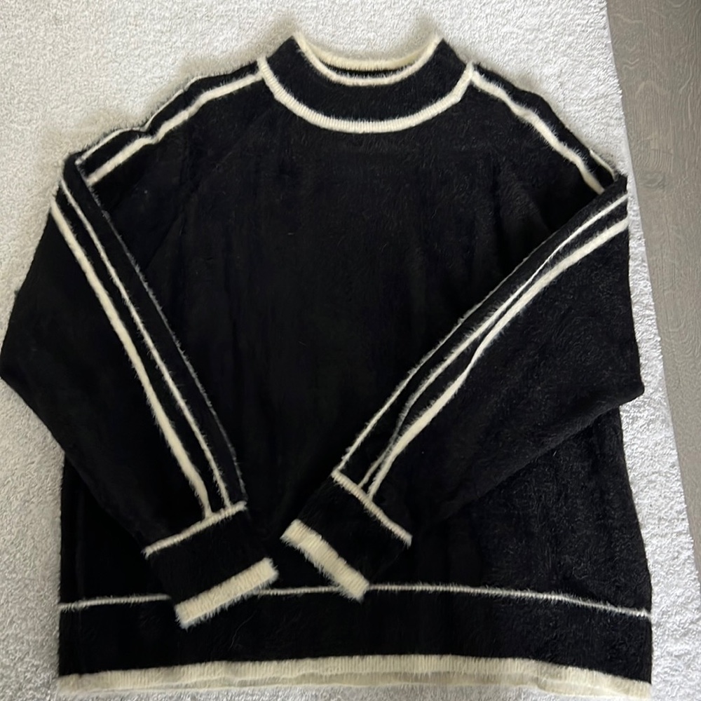 Black sweater, size M.